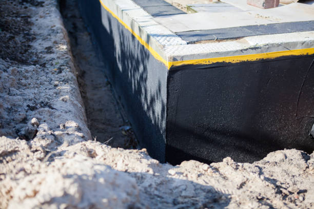 Professional Emergency Waterproofing technician working in East Rochester, NY